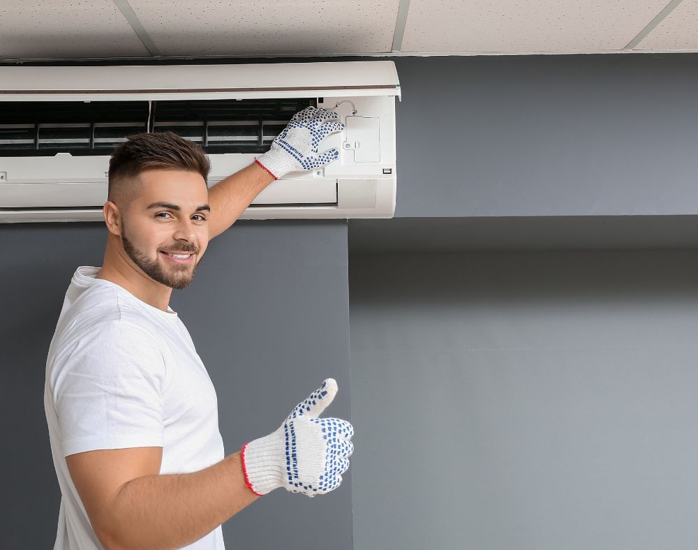 Air conditioning technician after a service