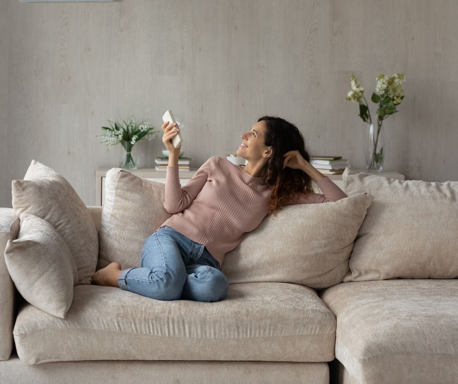Relaxing on the sofa with the air conditioning on