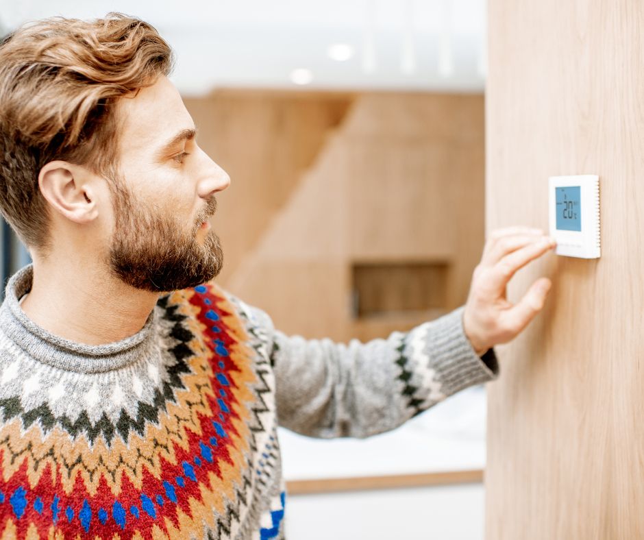 Setting a home air conditioning thermostat