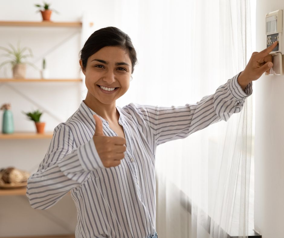 Happy homeowner with a new air conditioner