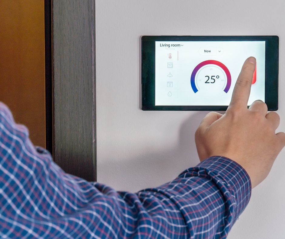 Homeowner adjusting a ducted air conditioning controller