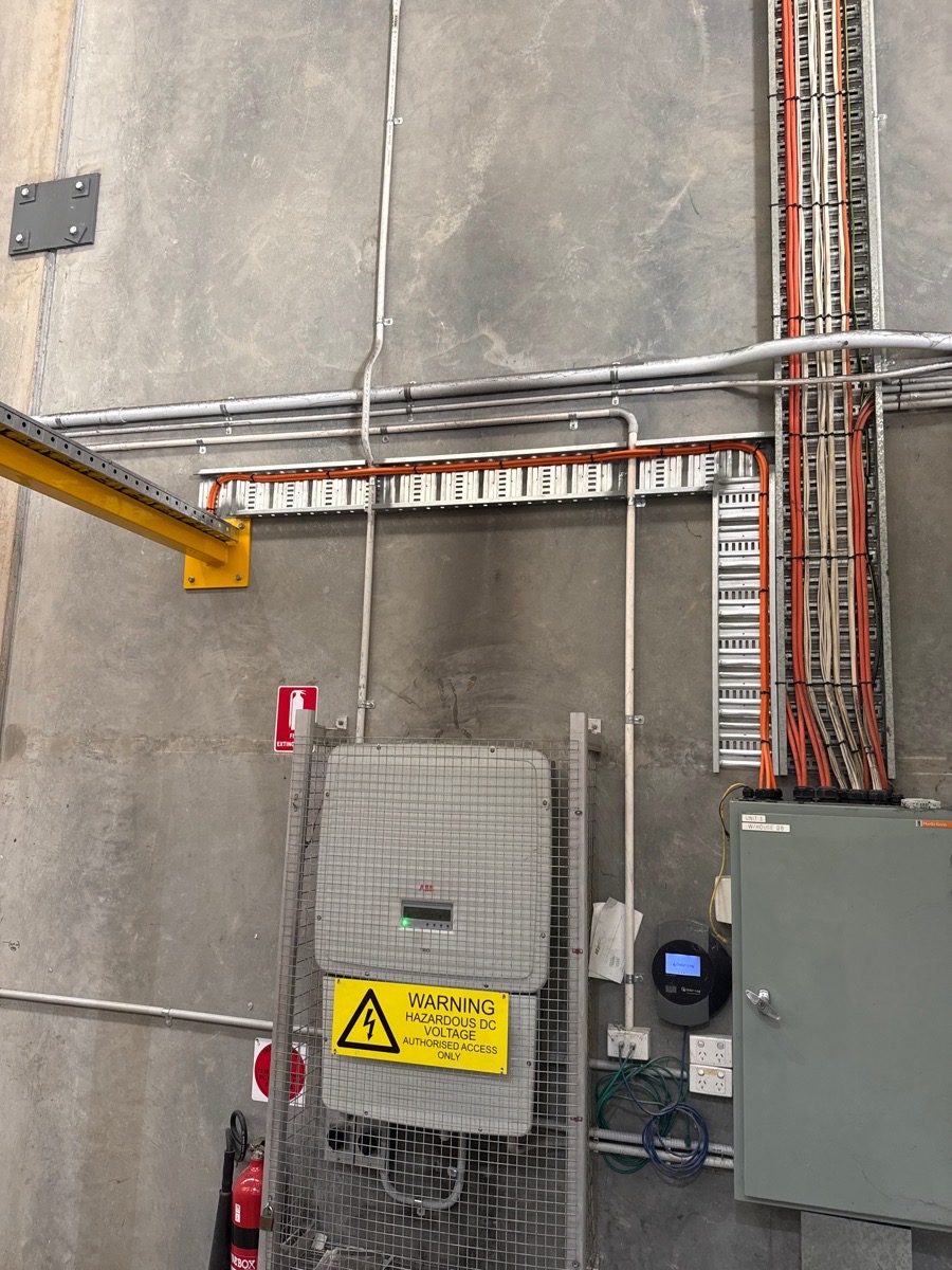 Commercial cable tray installed for warehouse lighting and power